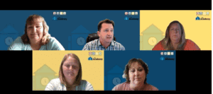 A group of people meeting over zoom. Each person's head appears in its own box.
